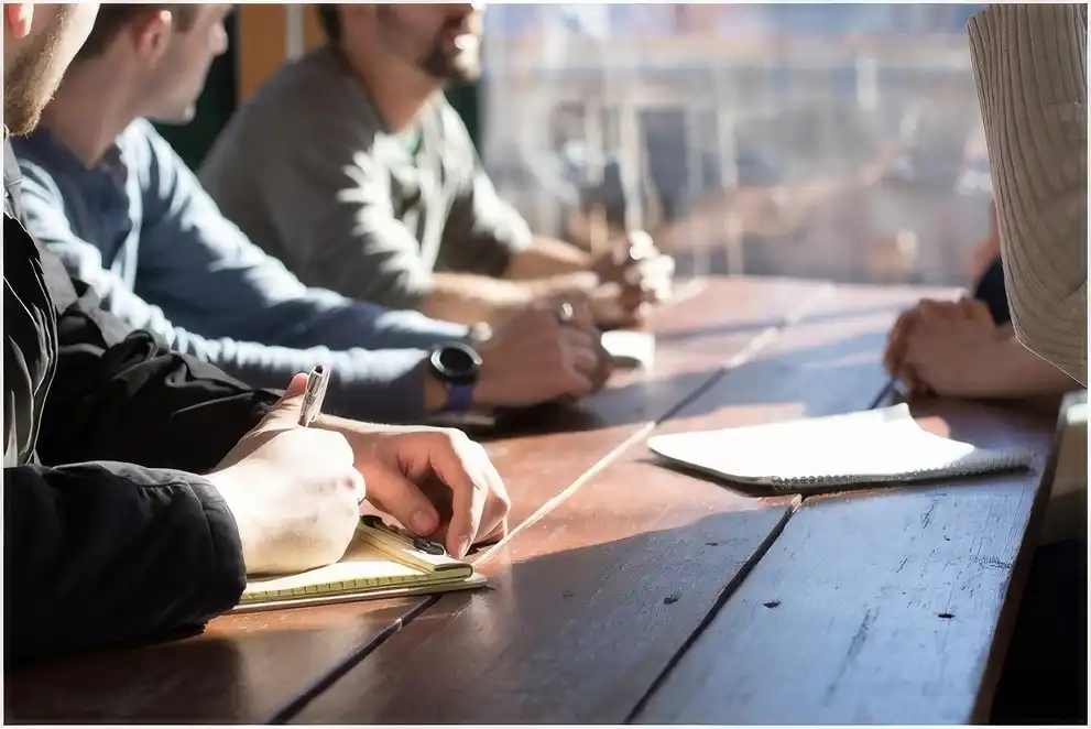 photo of reading glasses and screens of computer code